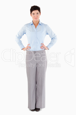 Serious businesswoman standing up