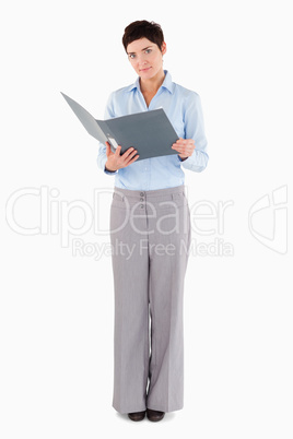 Businesswoman holding a binder