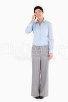 Serious woman making a phone call