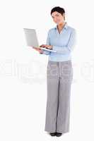 Woman holding a laptop