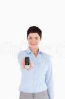Portrait of a businesswoman showing a cellphone