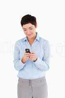 Portrait of a businesswoman sending text messages