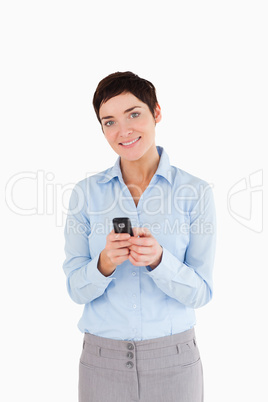 Portrait of a woman sending text messages