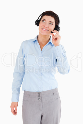 Portrait of a smiling office worker with a headset