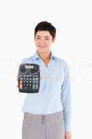 Businesswoman showing a calculator