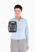 Office worker showing a calculator
