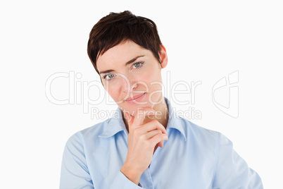 Close up of a businesswoman with her hand on her chin