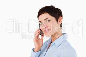 Close up of a serious woman on the phone