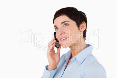 Close up of a serious woman making a phone call