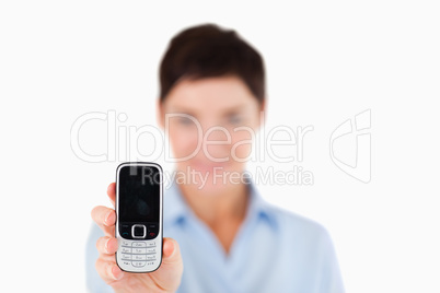 Close up of a woman showing a cellphone