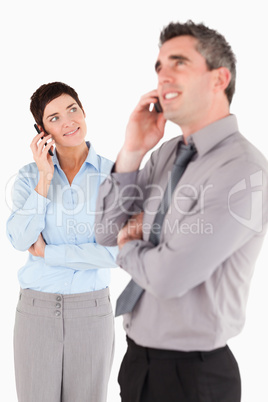 Portrait of office workers making a phone call