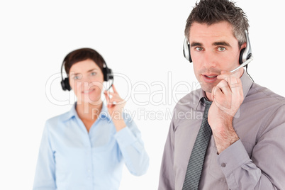 Office workers with headsets