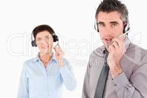 Office workers with headsets