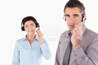 Office workers using headsets