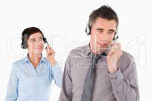 Business people using headsets
