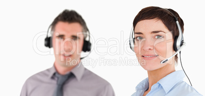 Close up of managers using headsets