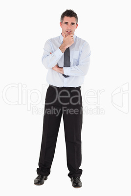 Businessman with his hand on his chin