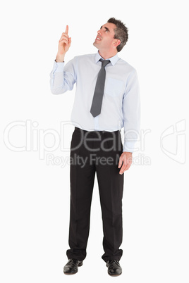 Man pointing at copy space