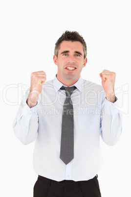 Portrait of a cheerful businessman with the fists up