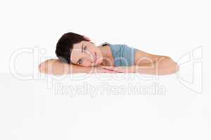 Woman lying on a blank space