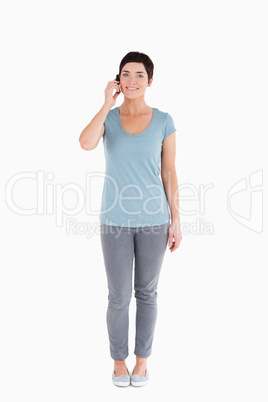 Serene woman answering the phone
