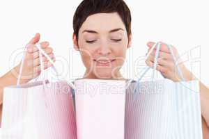 Woman looking at her shopping bags