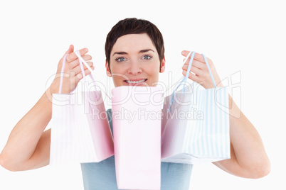 Woman showing her shopping bags