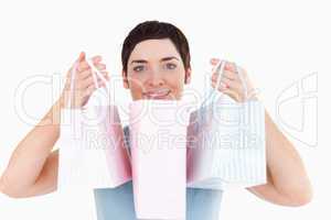 Woman showing her shopping bags