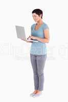 Cute woman using a laptop