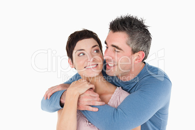 Smiling couple embracing