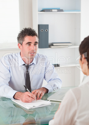 Portrait of a manager interviewing an applicant