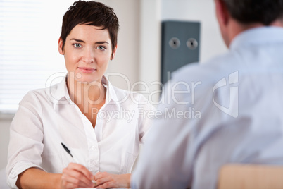 Manager interviewing a male applicant