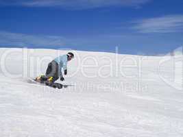 Snowboarder against beautiful sky