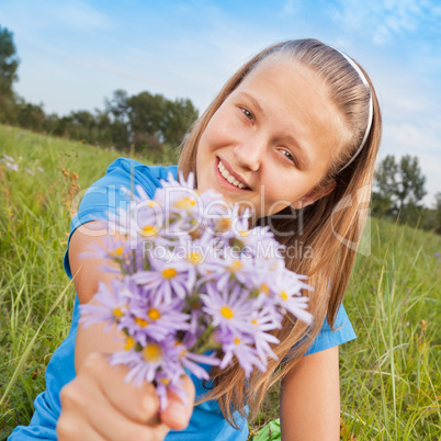 girl and camomiles