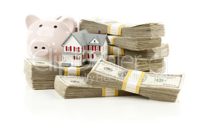 Small House and Piggy Bank with Stacks Money
