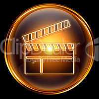 movie clapper board icon golden, isolated on black background.