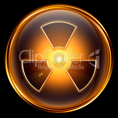 Radioactive icon golden, isolated on black background.