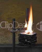 flames on stack of pressed hard drives