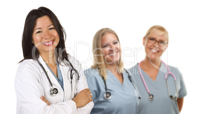 Hispanic Female Doctor and Colleagues Behind