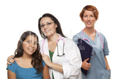 Hispanic Female Doctor with Child Patient and Colleague Behind