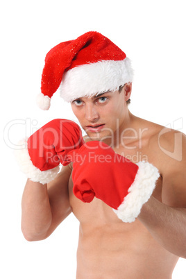 Sexy muscular man wearing a Santa Claus hat