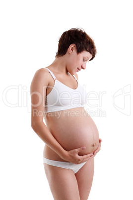 Pregnant young woman in lingerie