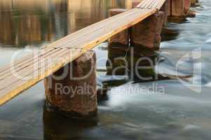 Wooden bridge on the river