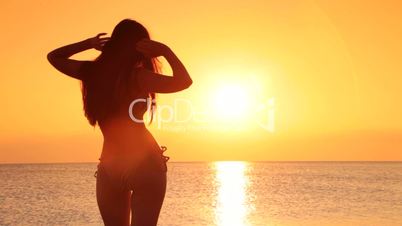 female silhouette at sunset