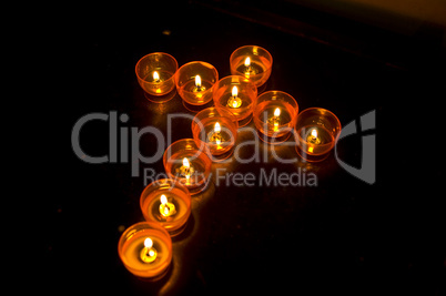 Cross of candles