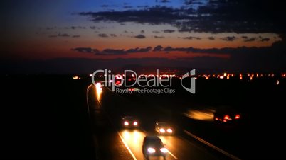 Car Driving on highway at dusk