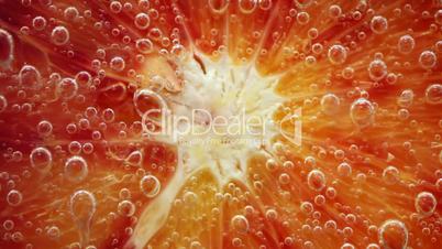 Abstract background. A citrus close up with bubbles
