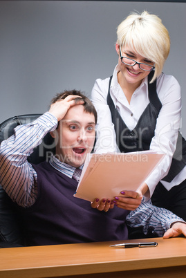 Businesspeople reading documents