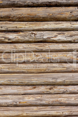 Wooden logs wall of rural house background