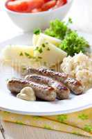 Bratwürstchen mit Kartoffeln / grilled sausages with potatoes